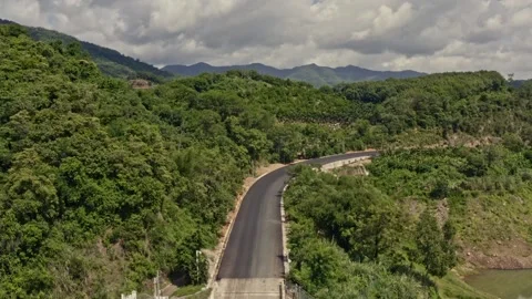 Mountain road take off and fly towards mountains aerial b-roll Stock Footage 160881982