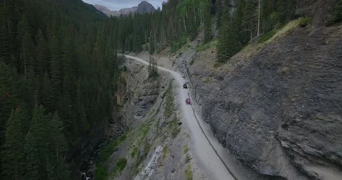 Mountain Road Through Alpine Forest Colorado Aerial 스톡 동영상 331113532