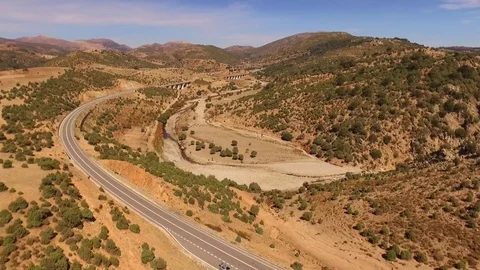 Mountain Road Through Valley Stock Footage 82397641