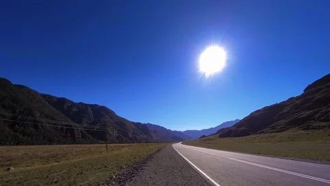 Mountain road timelapse at the summer or autumn sunset sunrise time. Wild nature Stock Footage 119890306