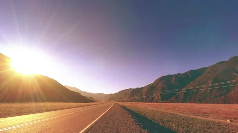 Mountain road timelapse at the summer or autumn sunset sunrise time. Wild nature Stock Footage 147213706