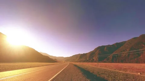 Mountain road timelapse at the summer or autumn sunset sunrise time. Wild nature Stock Footage 169647060