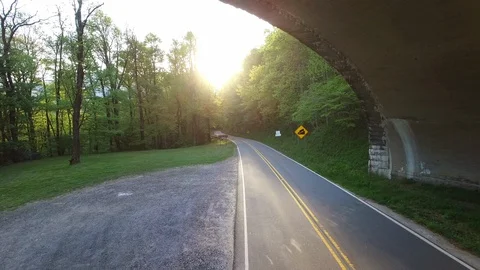 Mountain Road Under a Bridge Stock Footage 128546230