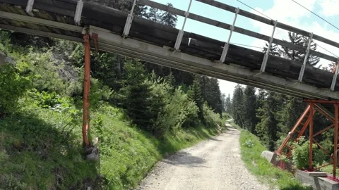 Mountain Road Under The Old Skilift Bridge Stock-Footage 159916178