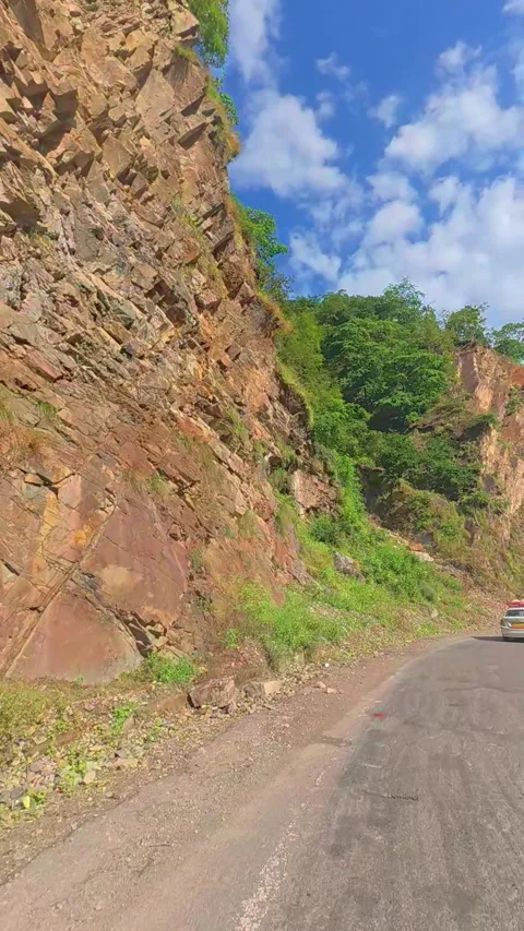 Mountain road view from car Stock Footage 319945310