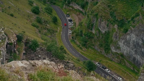 Mountain Road Viewed from Cliffs Over Scenic Valley Stock-Footage 337716869