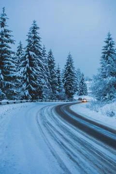 Mountain road while snow blizzard is dangerous Stock Photos