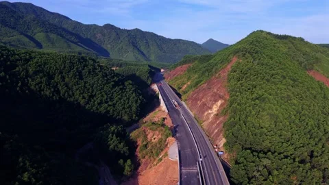Mountain Road Winding Through Green Valley In Northern Vietnam Stock Footage 337807632