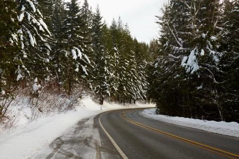 Mountain road in winter Stock Photos