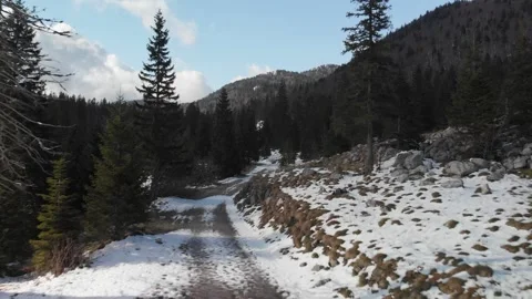 Mountain road in winter time Stockbeeldmateriaal 273720096