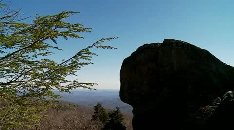 Mountain Rock &amp; Blue Sky Stock Footage 12574759