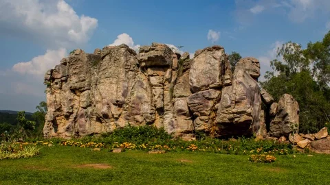Mountain rock hyperlapse movement clouds blue sky Stock Footage 96323773