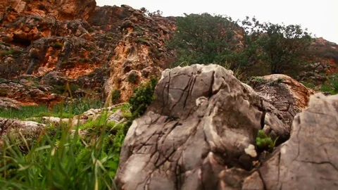 Mountain rocks and foliage Stock Footage 74091190