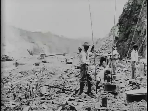 Mountain rocks being exploded during Panama canal construction - 1900 Stock Footage 108625918