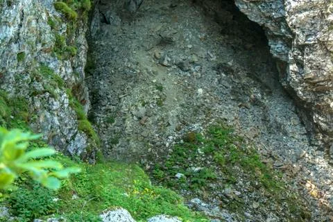 Mountain rocks with cave in them Stock Photos