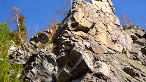 Mountain rocks, trees landscape on blue sky. Calm natural scene. Stock Footage 253216549