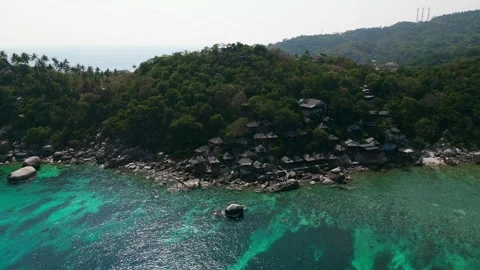 Mountain rocky coastline dotted with authentic hotels and houses for private Stock Footage 250172911