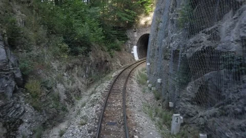 Mountain route journey on train railroad tracks, point of view from driver's  Stock Footage 325561053