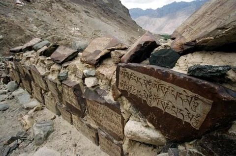Mountain route paved with scripture Stock Photos