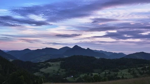 Mountain rural scenery. Clouds forming over the mountain on the horizon. Pastel Video stock 246969831