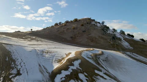 Mountain of Sand Covered in Snow Stock Footage 245130119