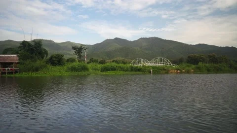 Mountain scape view from Duck Pedal Boat in river. Stockbeeldmateriaal 141207050