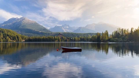 Mountain scene with mountain hotel next to a lake Stock Footage 95941503