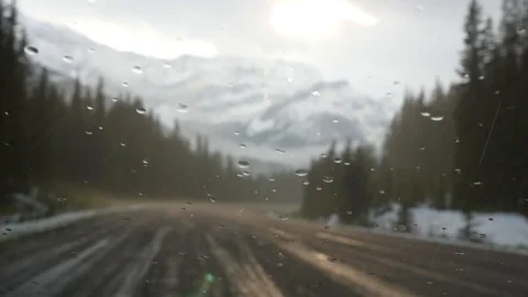 Mountain scene through rainy windshield Stock Footage 111400927