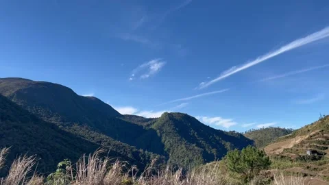 Mountain scenery and field Stockbeeldmateriaal 276202846