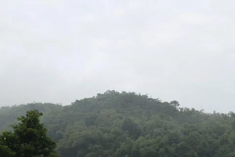 Mountain scenery with dark clouds in the background Stock Photos