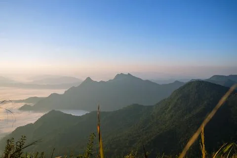 Mountain scenery with sky and white clouds with morning sun with beautiful na Stock Photos