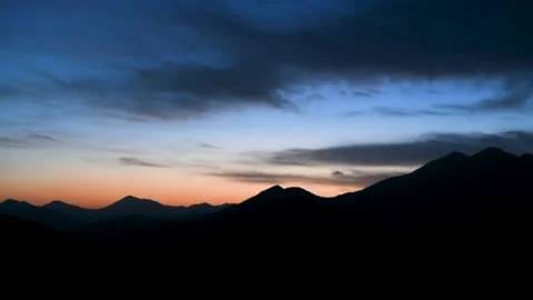 Mountain scenery under the setting sun Stock Footage 167522656