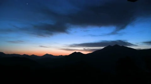 Mountain scenery under the setting sun Stock Footage 167522682
