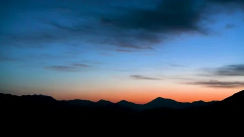 Mountain scenery under the setting sun Stock Footage 167522761