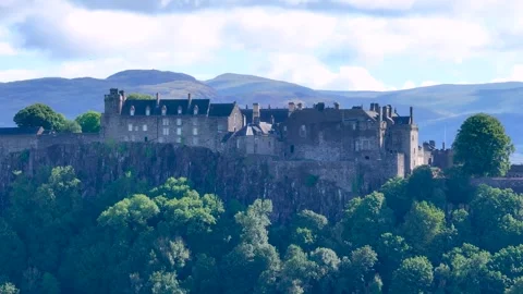 A mountain with a Scottish castle on top, close up Stock Footage 306625365