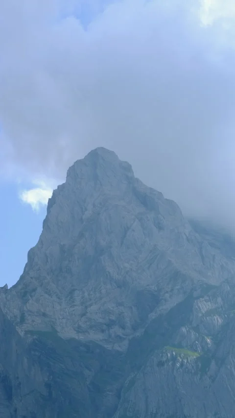 Mountain scree peak in low clouds. climbing concept Stock Footage 284615488
