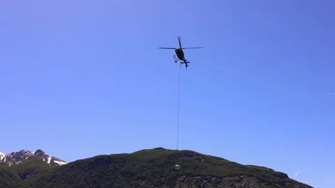 Mountain search and rescue operation in helicopter Stock Footage 291213073