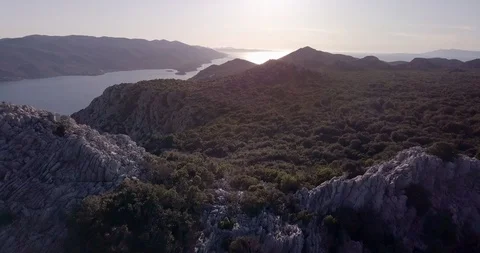 Mountain at the Seaside in Sunset Stock Footage 90820423