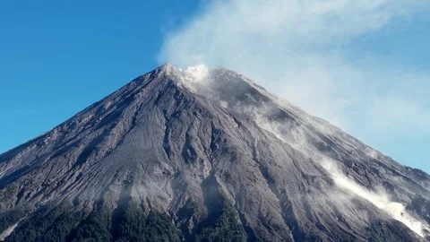 Mountain Semeru loom under bright skies Stock Footage 345499496