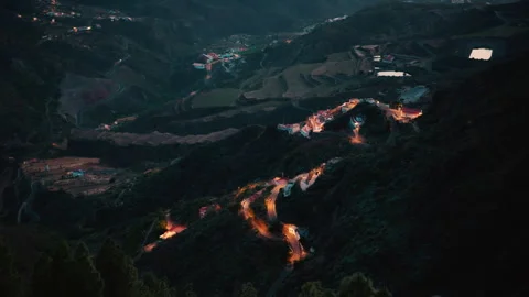 Mountain settlements in evening twilight, lanterns illuminate these settlements Stock Footage 345995324