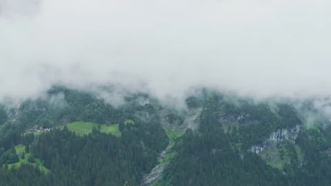 Mountain shrouded in clouds Video stock 219743537