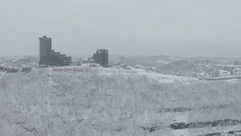 Mountain side in winter in front of major city Stock Footage 145550225