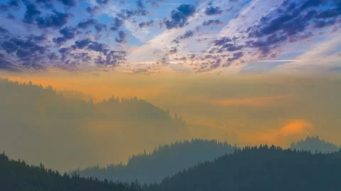 Mountain silhouette in dense mist at the sunset time lapse scene Vídeos de archivo 160913471