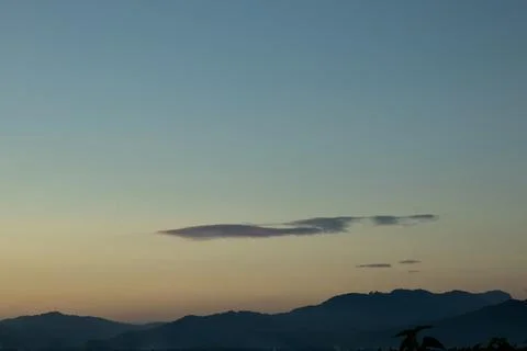 Mountain Silhouette at Sunset Фото