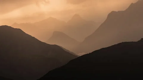 Mountain Silhouettes with clouds in the sunset. Dolomites, Italy, 8k Stock Footage 247642955