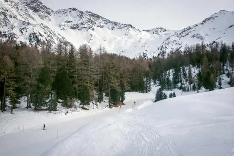 Mountain skiing - panoramic view  at the ski slopes  Aosta Valley,  Italy . Stock Photos