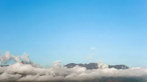 Mountain sky clouds formation motion time lapse,climate weather nature science Stock Footage 149155850