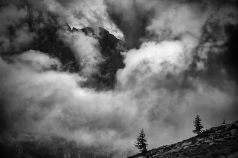 Mountain slope in the clouds Stock Photos