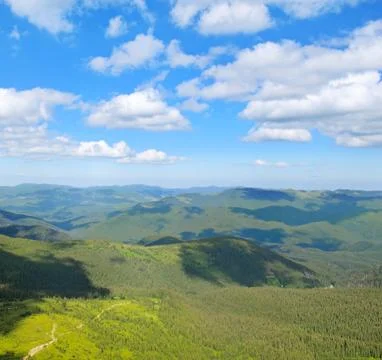 Mountain slopes covered with forests. Stock-Fotos