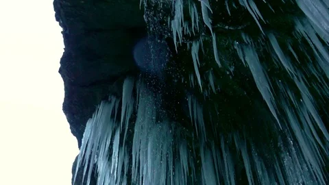 Mountain slopes covered in ice and icicles Stock Footage 99244206